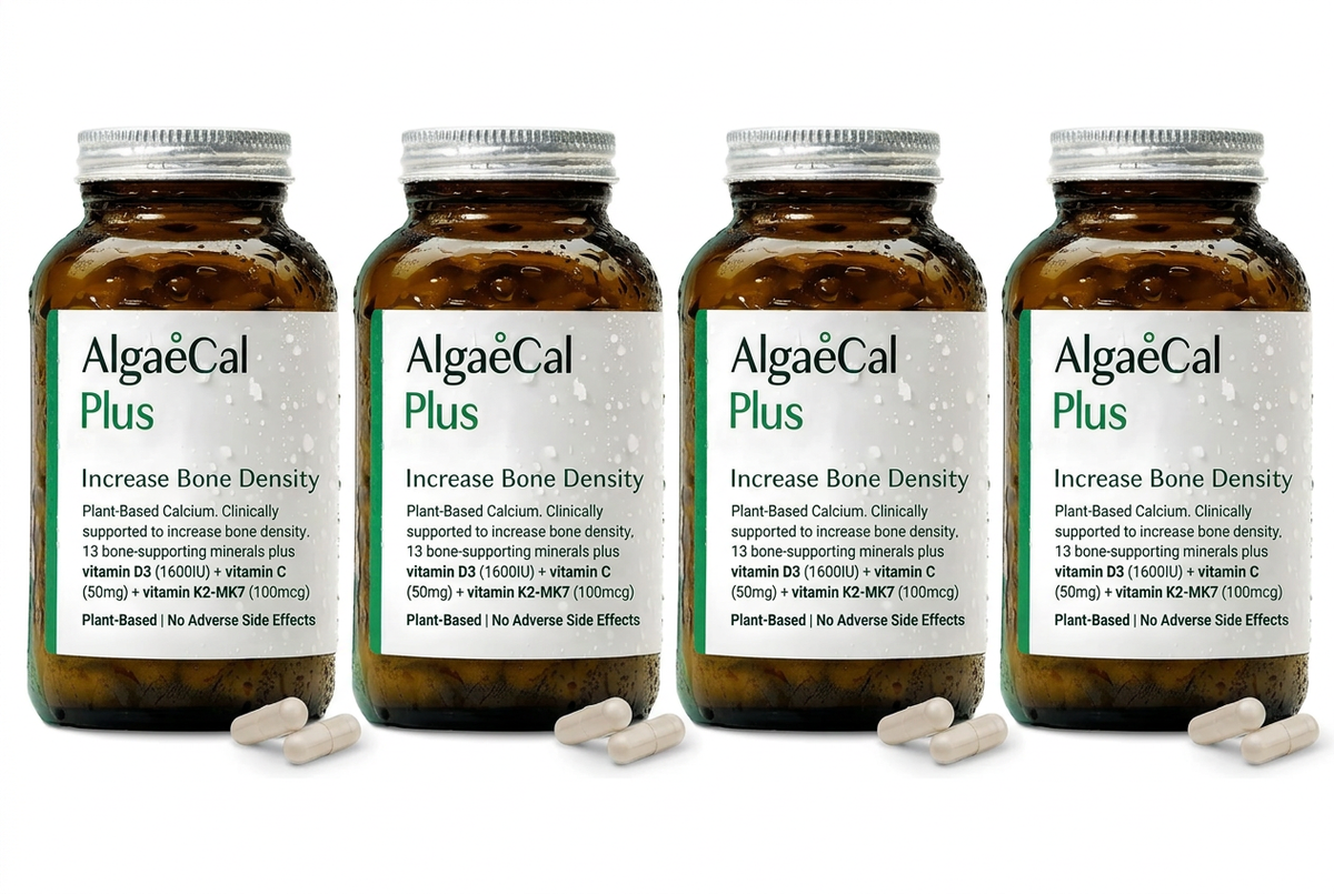 Four AlgaeCal Plus bottles in a row on a white background