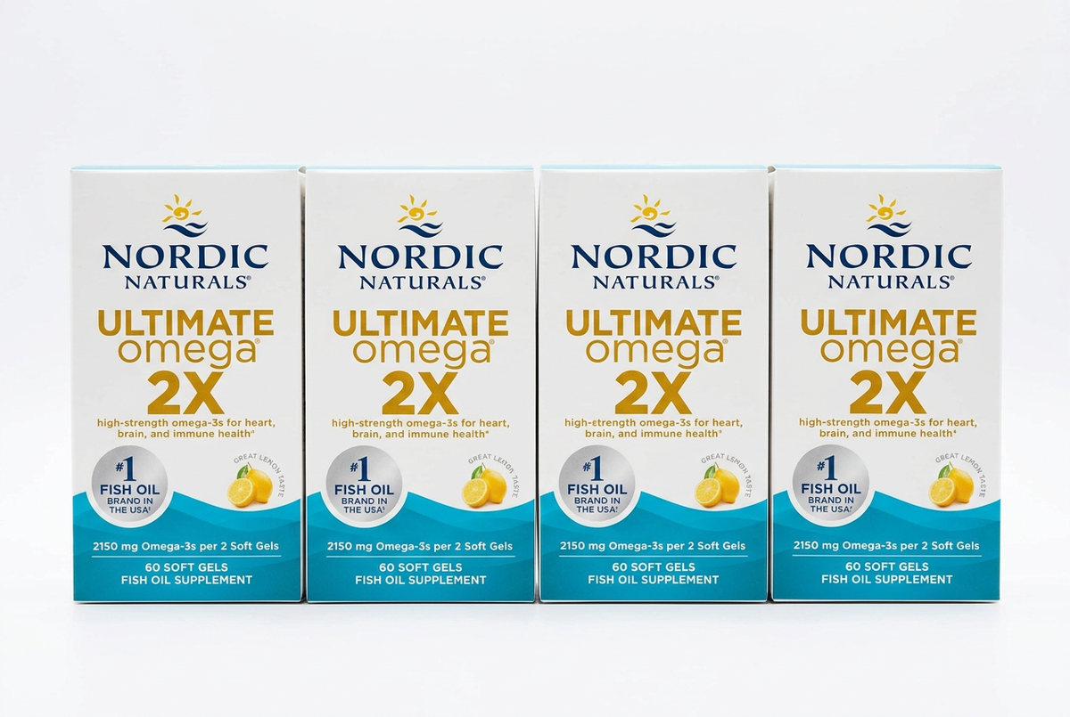 Four Nordic Naturals Ultimate Omega 2X boxes in a row on a white background