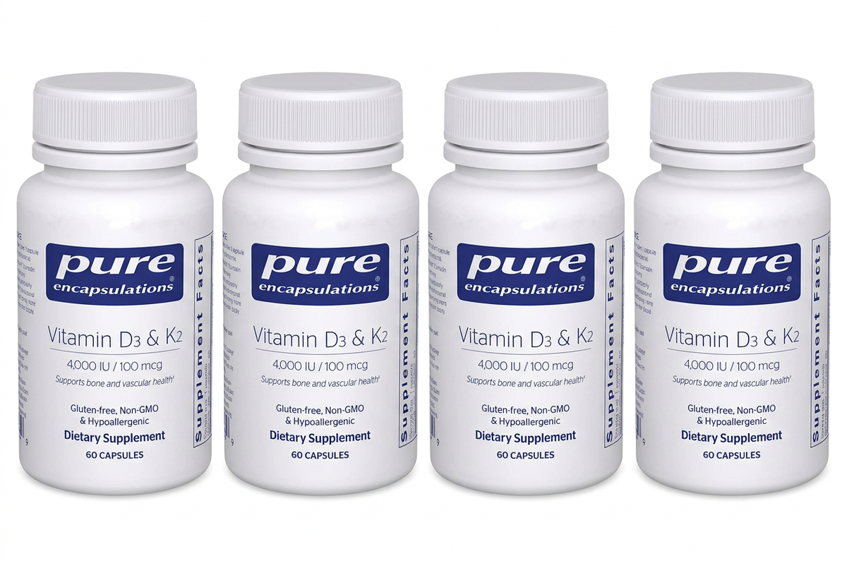 Four Pure Encapsulations Vitamin D3 & K2 bottles in a row on a white background