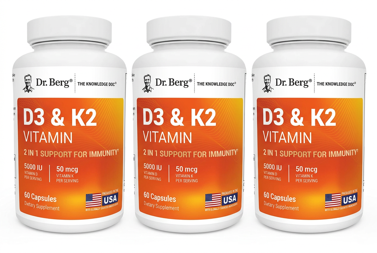 Three Dr. Berg D3 & K2 bottles in a row on a white background