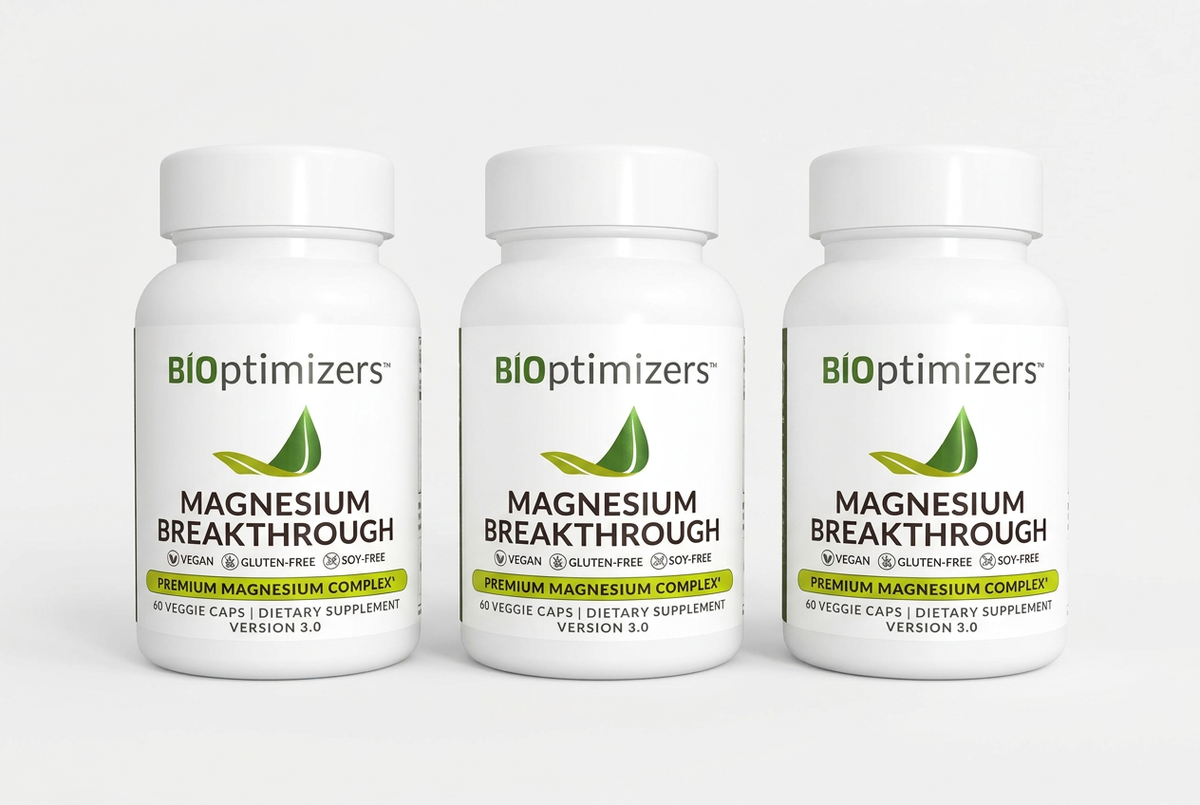 Three Magnesium Breakthrough bottles in a row on a white background