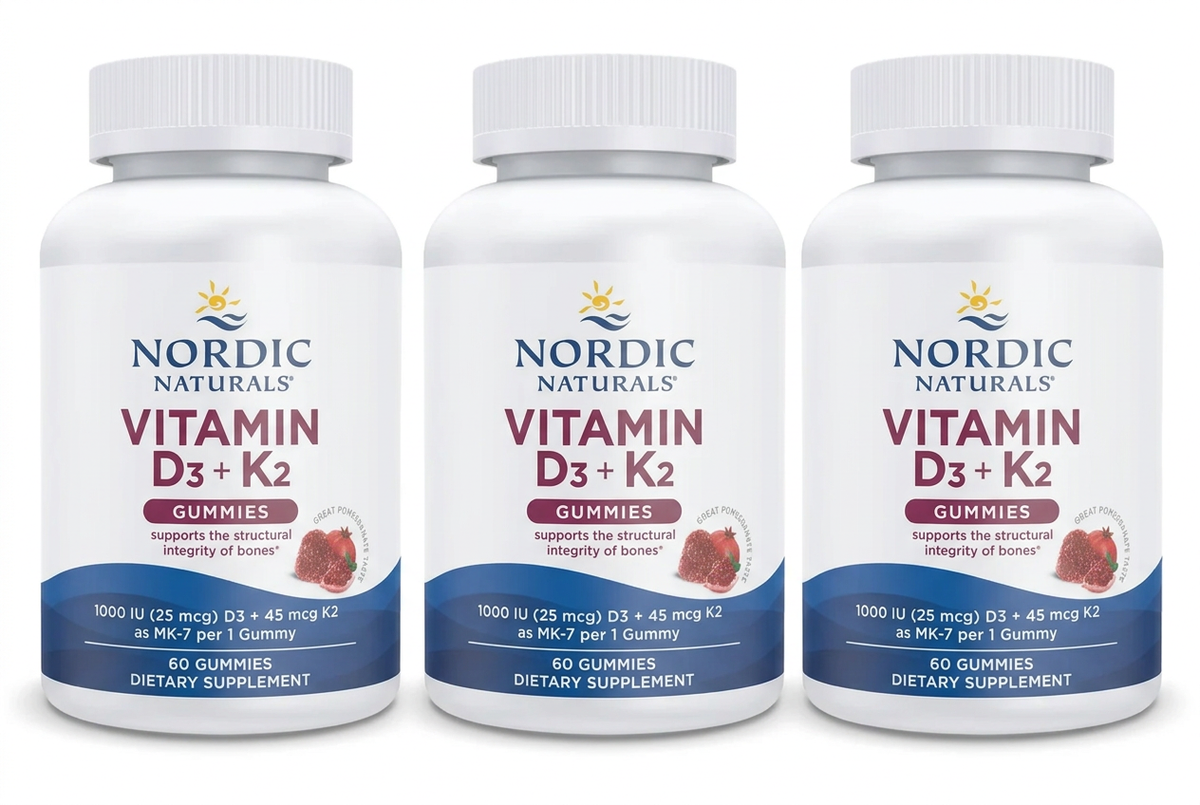 Three Nordic Naturals Vitamin D3 + K2 Gummies bottles in a row on a white background