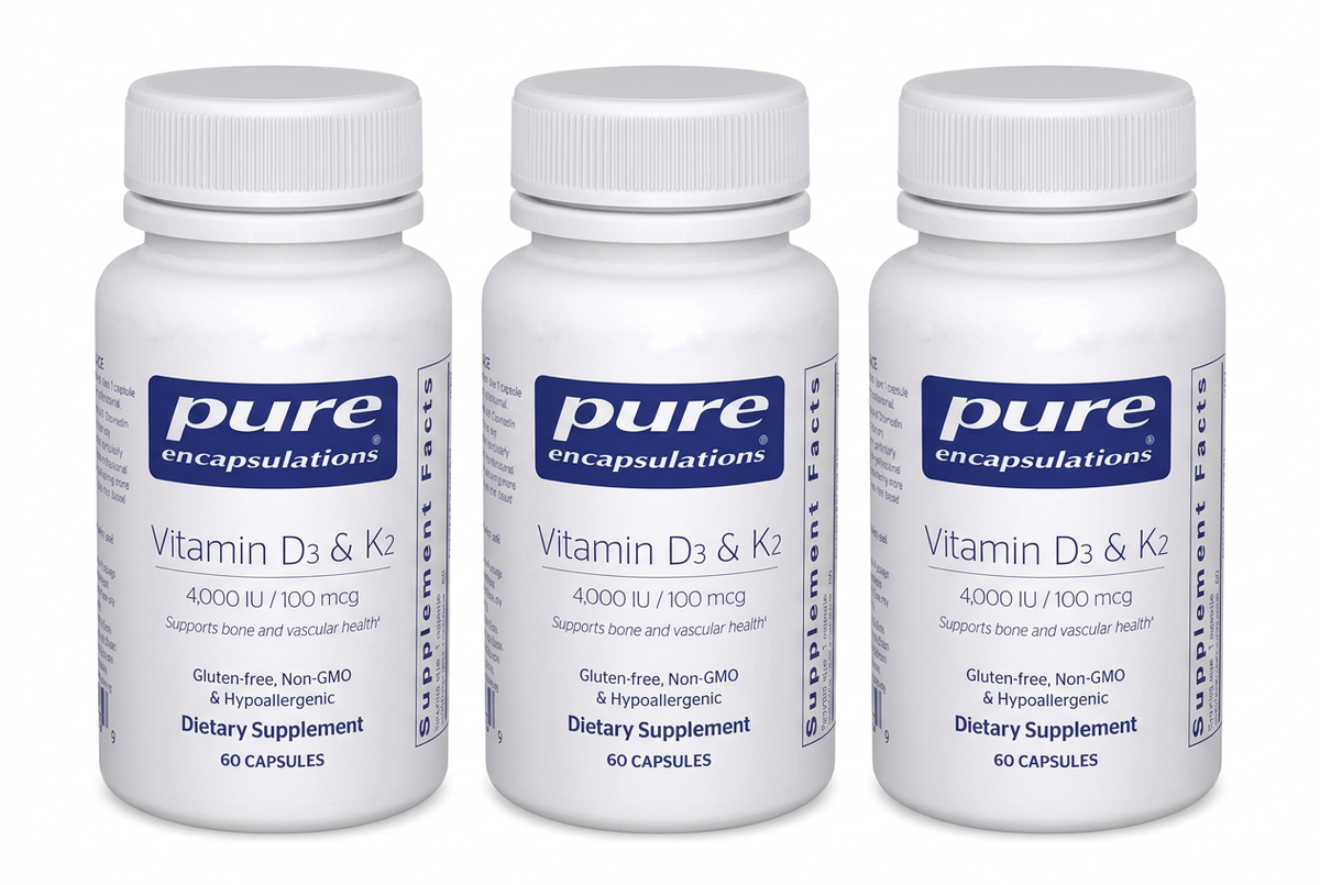 Three Pure Encapsulations Vitamin D3 & K2 bottles in a row on a white background